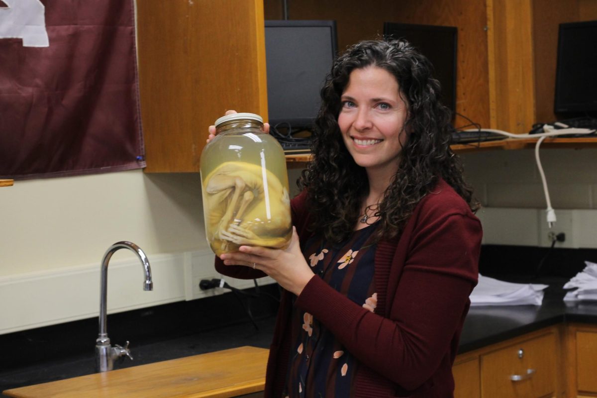 Mrs. Downen posing with the deer fetus she collected all those years ago.